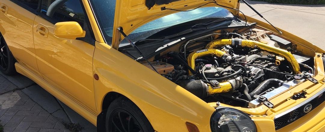 READERS RIDES: Michael's 2003 Sonic Yellow WRX